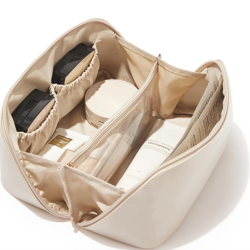 New-- Never Used Asymmetrical Cream Cosmetic Bag